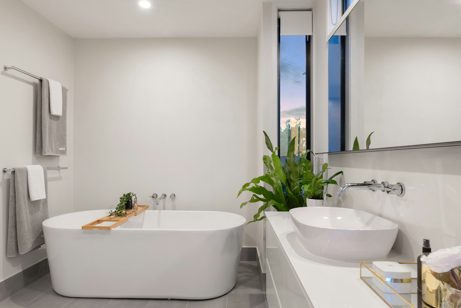 Reviewed bathroom with clean neutral look.